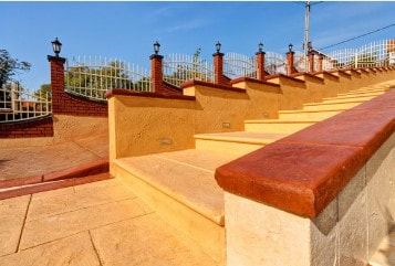 Southwestern-themed stamped walk with steps