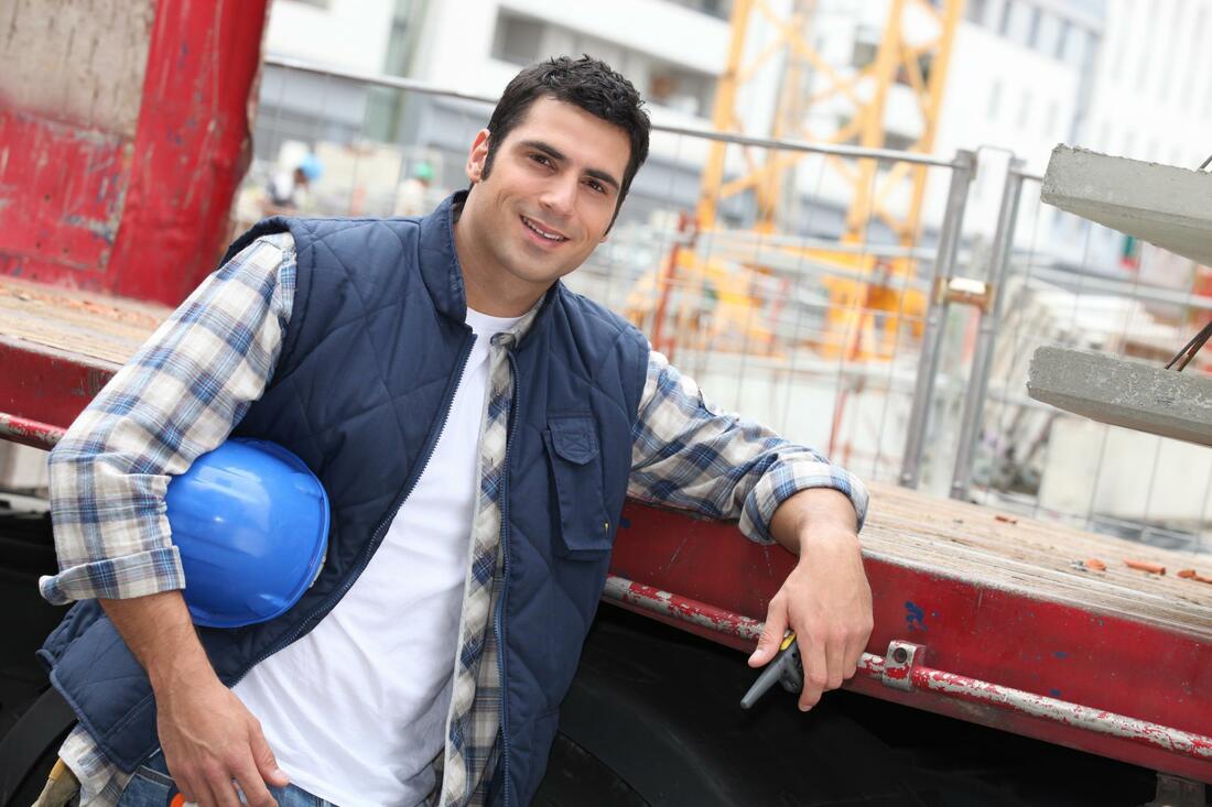 Concrete contractor satisfied after a hard day's work